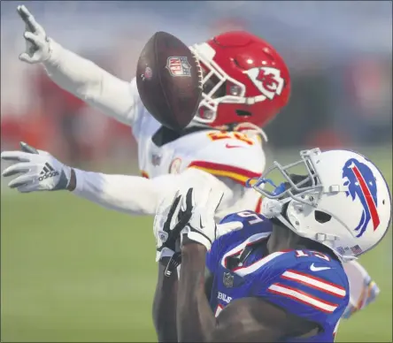  ?? JEFFREY T. BARNES - THE ASSOCIATED PRESS ?? Kansas City Chiefs safety Juan Thornhill (22) breaks up a pass to Buffalo Bills’ John Brown (15) during the first half of an NFL football game, Monday, Oct. 19, 2020, in Orchard Park, N.Y.