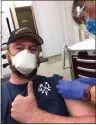  ?? TYLER GRINBERG — MENDOCINO VOLUNTEER FIRE DEPARTMENT ?? Capt. Winegar of the Mendocino Volunteer Fire Department receives his first dose of the Coronaviru­s vaccine.