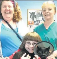  ??  ?? n Caroline and Summer Shervill with vet Dr Hazel Lee and a recovering Milo; (right) the needle and thread