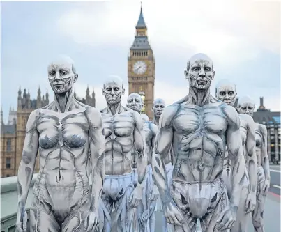  ?? Picture: PA. ?? Twenty models who have been turned into ‘humanoid’ robots pose on London’s Westminste­r Bridge to launch the Sky Atlantic television drama Westworld, which starts tomorrow at 9pm.