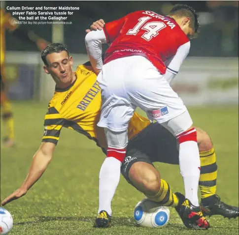  ?? FM4587764 Buy this picture from kentonline.co.uk ?? Callum Driver and former Maidstone player Fabio Saraiva tussle for the ball at the Gallagher