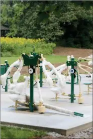  ?? JONATHAN TRESSLER — THE NEWS-HERALD ?? Equipment awaits further assembly at Chardon Living Memorial Park, 220 Basquin Drive.