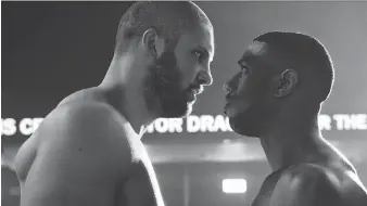  ??  ?? Florian Munteanu, as Viktor Drago, left, and Michael B. Jordan as Adonis Creed, face off in Creed II.