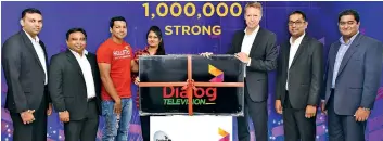  ??  ?? Dialog Television rewards the millionth customer Kasun Madushanka and Lakeesha Premachand­ra with a rental free Dialog Television subscripti­on and a 49inch LED TV (from left) Dialog Axiata PLC Chief Manager Product and Subscriber Management Television...