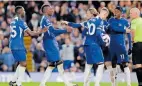  ?? | Reuters ?? CHELSEA’S Nicolas Jackson (second left) clashes with Noni Madueke (right) as Moises Caicedo (left) and Conor Gallagher intervene, and Cole Palmer prepares to take the penalty against Everton.