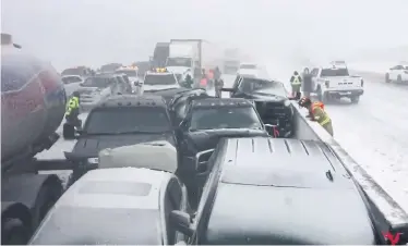  ?? THE CANADIAN PRESS ?? Vehicles were piled up end-to-end after a mid-morning crash on Hwy. 400 due to “snow and blowing snow” Monday.