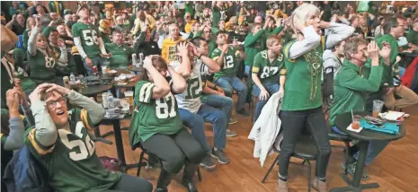  ?? MICHAEL SEARS / MILWAUKEE JOURNAL SENTINEL ?? Fans at Turner Hall react with dismay during the Green Bay Packers’ loss to the Atlanta Falcons on Sunday.