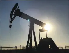  ??  ?? An oil pump is seen operating in the Permian Basin near Midland, Texas. Break evens for a 30% profit have been almost halved to just $45 a barrel in the prolific Permian Basin.