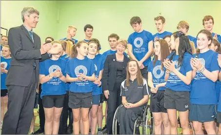  ?? Picture: Angus Findlay. ?? Commonweal­th Games and Sport Minister Shona Robison and Meggan Dawson-Farrell, centre, with pupils and sport leaders at Perth High School.