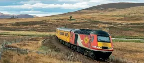  ?? Niall Laybourne ?? Colas power cars Nos. 43272 and 43257, forming the 1Q78 08.46 Inverness-Inverness (via Thurso/Wick), cross the Helmsdale River, south of Kinbrace, as they head back south on October 30.