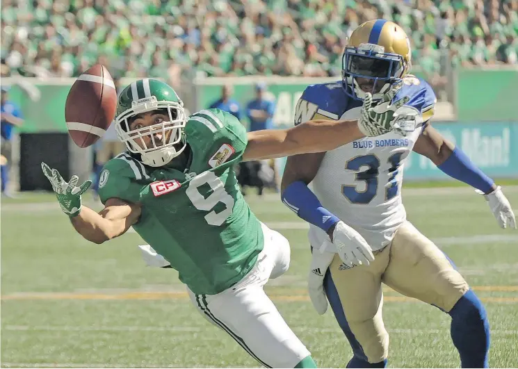  ?? — THE CANADIAN PRESS FILES ?? Winnipeg-born receiver Nic Demski, left, agreed to terms with the Blue Bombers on Tuesday, the first day of CFL free agency.