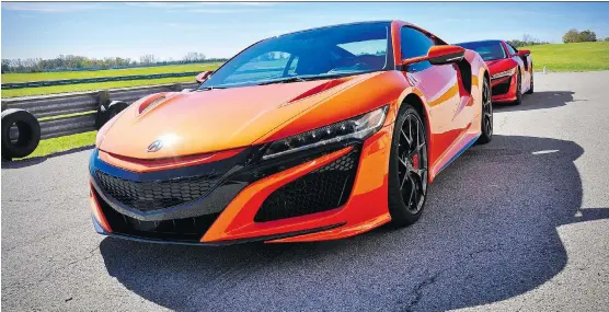  ?? PHOTOS: DEREK McNAUGHTON/DRIVING ?? The 2019 Acura NSX is decked out in a stunning new Thermal Orange Pearl paint and is said to be marginally quicker than the 2018 model.
