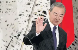  ??  ?? HOPING FOR THE BEST: In this file photo, China’s State Councillor and Foreign Minister Wang Yi waves as he leaves a news conference in Tokyo, Japan.