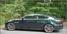  ?? MARC GRASSO/MEDIANEWS GROUP ?? The Jaguar XF gives you a lot of bang for your buck, getting you into the luxury world without costing you your left arm. The curves, the comfort and the class, it’s all there.