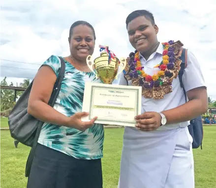  ?? Photo: Arieta Vakasukawa­qa ?? Winner of the Secondary School Oratory Competitio­n, Swami Vivekanand­a College student Nohal Goundar with his teacher Naomi Rokobiri during the Western Division Clean-Up Campaign Launch at Nawaka District School in Nadi on March 23, 2018.