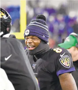  ?? KENNETH K. LAM/BALTIMORE SUN ?? Ravens’ Lamar Jackson celebrates victory over the Jets on the sideline in the fourth quarter at M & T Bank Stadium.