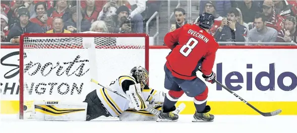  ?? GETTY IMAGES ?? Washington’s Alex Ovechkin scores on Boston goalie Anton Khudobin last week.