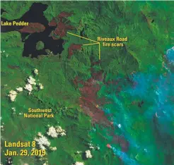  ?? Picture: USGS ?? A Landsat 8 image of the 2019 Riveaux Road fire in Tasmania, near Lake Pedder. The fire started as a result of a lightning strike on January 15. The red areas in this thermal image show places already affected by the fire. The image also shows active burning.