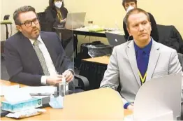  ?? AP ?? Defense attorney Eric Nelson (left) and defendant Derek Chauvin listen to Hennepin County Judge Peter Cahill after the judge turned the case over to the jury.