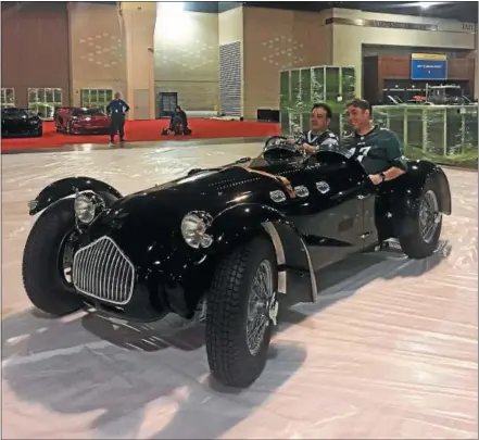  ?? SUBMITTED PHOTO ?? Kevin Mazzucola, Executive Director of the Auto Dealers Associatio­n of Greater Philadelph­ia (left), and Ian Jeffery, Chairman of the Philadelph­ia Auto Show, hop in the classic 1951 Allard J Race Car.