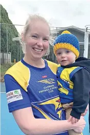  ?? ?? Ellinbank’s Stefanie Backman gets a hug from son William before playing her 500th game on Saturday.