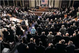  ?? PABLO MARTINEZ MONSIVAIS/THE ASSOCIATED PRESS ?? President Donald Trump is applauded Tuesday as he addresses a joint session of Congress on Capitol Hill in Washington.