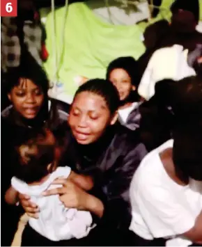  ??  ?? Let’s dance: A still from a video showing a group of Nigerian women, one bouncing a baby on her knee, keeping up their spirits by dancing and clapping in the dark. There are 123 unaccompan­ied minors on the Aquarius rescue ship