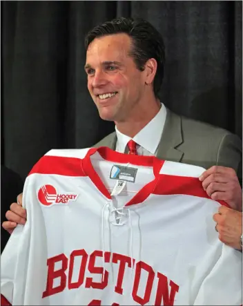  ?? NANCY LANE / HERALD STAFF FILE ?? David Quinn, seen here at his introducti­on as BU head coach in 2013, is the frontrunne­r for the Bruins head job.