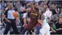  ??  ?? LeBron James and the Cavaliers face a 2-0 deficit against Terry Rozier and the Celtics.