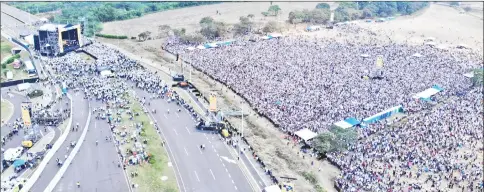  ??  ?? An aerial view taken from the Colombian side of Tienditas Internatio­nal Bridge at the border between Colombia and Venzuela shows the stage of ‘Venezuela Aid Live' concert, organised by Branson to raise money for the Venezuelan relief effort. — AFP photo