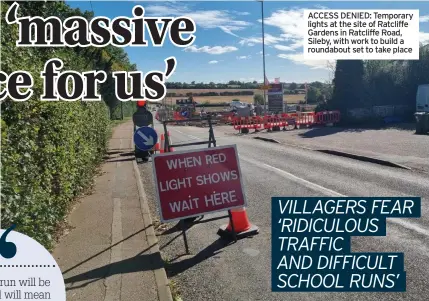  ?? ?? ACCESS DENIED: Temporary lights at the site of Ratcliffe Gardens in Ratcliffe Road, Sileby, with work to build a roundabout set to take place