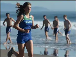  ?? ALAN DEP — MARIN INDEPENDEN­T JOURNAL ?? Caitlin Evers of Branson is first to finish the first leg of the MCAL girls cross country relay at Stinson Beach lin September of 2019. New California guidelines allow for cross country to take place while a county is in the widespread purple tier.