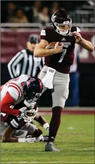  ?? AP/ROGELIO V. SOLIS ?? Mississipp­i State quarterbac­k Nick Fitzgerald (7) has been suspended for the Bulldogs’ season opener against Stephen F. Austin for a violation of team rules. Mississipp­i State Coach Joe Moorhead said the violation happened in March.