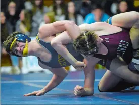  ?? SARAH GORDON/THE DAY ?? Ledyard’s Brayden Grim, left, has control over Killingly’s Alex White during a match last month at Ledyard. Grim is the No. 1 seed at 160 pounds for the ECC wrestling tournament, which begins today at Fitch High School.