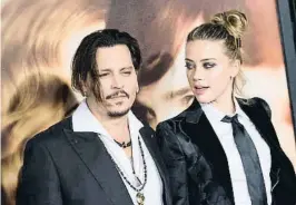  ?? VALERIE MACON / AFP ?? Dt l’amor a les demandes A dalt, Angelina Jolie i Brad Pitt el 2015, un any abans de separar-se; a baix, Johnny Depp i Amber !eard tamb" el 2015, deu mesos despr"s de #asar-se; el matrimoni $a durar 15 mesos