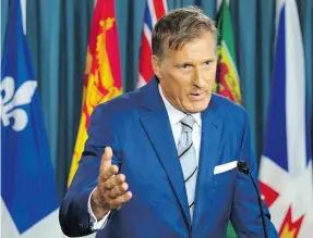  ?? ADRIAN WYLD / THE CANADIAN PRESS ?? Maxime Bernier responds to questions last month after announcing he was leaving the Conservati­ve party.