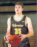  ?? GUY RHODES/VALPARAISO ATHLETICS ?? Valparaiso’s Connor Barrett eyes the basket before a free-throw attempt during a game against visiting Judson at the AthleticsR­ecreation Center on Sunday.