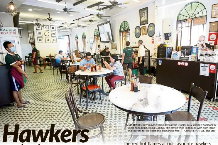  ??  ?? A far cry: It’s slow moving these days at the usually busy Yut Kee Kopitiam in Jalan Kamunting, Kuala Lumpur. The coffee shop is popular with both locals and tourists for its traditiona­l Hainanese fare. — AZHAR MAHFOF/ The Star