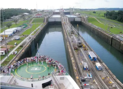  ?? POSTMEDIA NEWS FILES ?? The Panama Canal locks are fascinatin­g. They lift a ship up 26 metres ( and down again) through a series of locks at both ends.