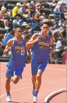  ?? JOHN T. DENNE/Taos News ?? Left: Questa Pole Vaulter Alianna Gonzales clears the bar at a height of 8 feet on her way to winning the 2A girls Pole Vault in convincing fashion on Saturday (May 7). Right: In the 2A boys 3200M race, Peñasco teammates Gilly Valdez, right, and Jude Martinez, left, made a statement in taking the top two places on Saturday (May 7).