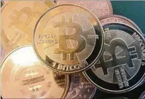  ?? ?? BITCOIN. La criptodivi­sa viene con un fuerte aumento este año.