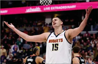  ?? MATTHEW STOCKMAN — GETTY IMAGES ?? Nikola Jokic of the Denver Nuggets reacts while playing the Houston Rockets in the fourth quarter at Ball Arena on December 08, 2023 in Denver.