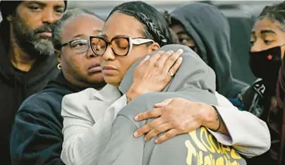  ?? KIM HAIRSTON/BALTIMORE SUN ?? Family members gather Thursday at a news conference following the death of Deanta Dorsey. The 16-year-old Edmondson-Westside High School student was fatally shot Wednesday at a shopping center across the street from the school.