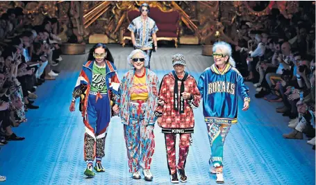  ??  ?? Older models – members of the public cast from the streets – took to Dolce & Gabbana’s catwalk in Milan yesterday. “Fashion speaks to everyone without any limitation of race, ethnicity, or age,” said the Italian fashion house.