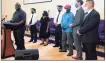  ??  ?? Clergy and New Haven officials joined Tuesday to call on residents to step forward with informatio­n about potential crimes.