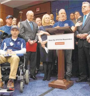  ?? JIM WATSON / AFP/GETTY IMAGES ?? Jon Stewart (center), flanked by Sens. Chuck Schumer and Kirsten Gillibrand and Rep. Pete King, tells reporters pols were not enthusiast­ic about renewing the Victim Compensati­on Fund for WTC survivors.