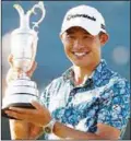  ??  ?? Collins Morikawa wins the British Open on debut yesterday