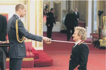  ??  ?? Rod being knighted by the Duke of Cambridge.
