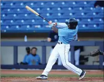  ?? TIM PHILLIS — FOR THE NEWS-HERALD ?? The Captains’ Victor Nova swings at a Fort Wayne pitch May 12 at Classic Park.