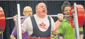  ?? CONTRIBUTE­D ?? Jackie Barrett is shown competing at the 2015 Special Olympics World Summer Games in Los Angles. In L.A., Barrett broke the Special Olympics record with a 656-pound deadlift, and his 611-pound squat set a new Newfoundla­nd and Labrador’s overall men’s master-1 super-heavyweigh­t record.